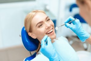 smiling woman having a dental exam